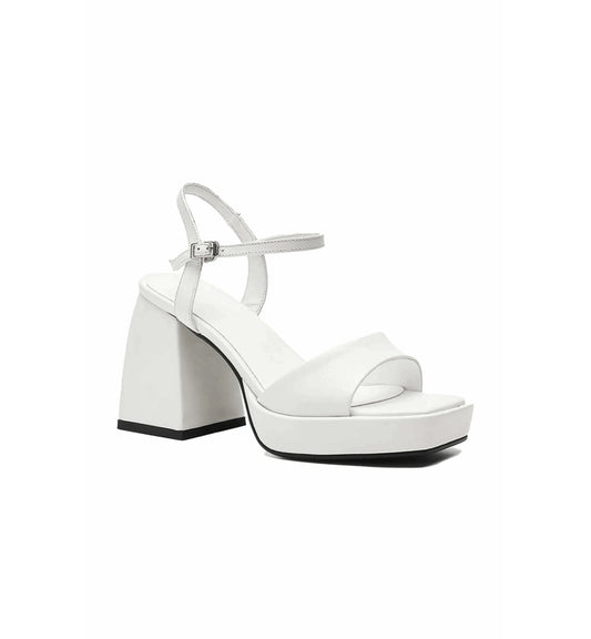 White sandal with block heel on a white background