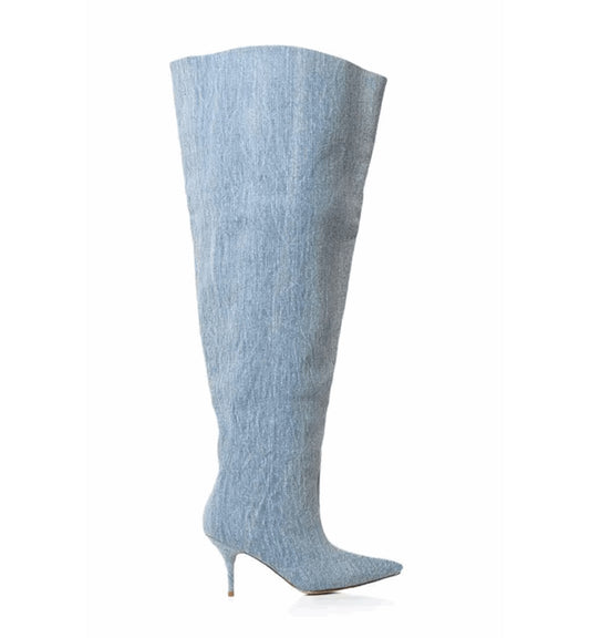Light blue knee-high boot on a white background