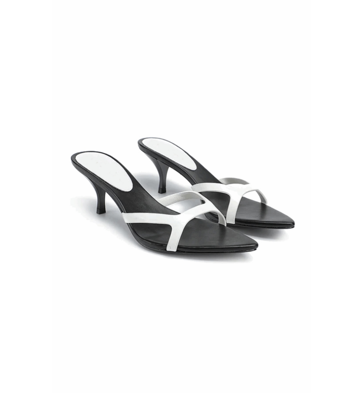 Black and white high-heeled sandals on a white background
