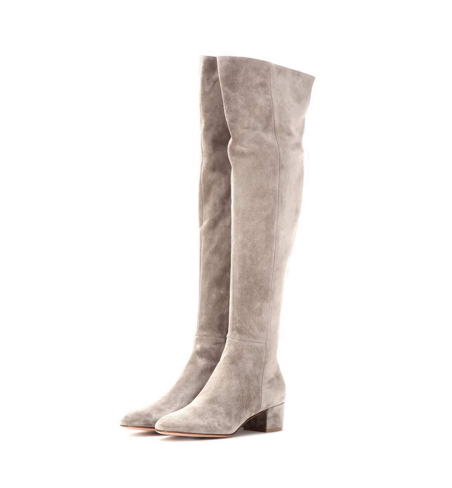 Pair of gray suede knee-high boots on a white background