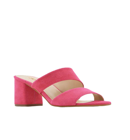 Pink sandal with a block heel on a white background