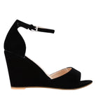 Black wedge sandal on a white background