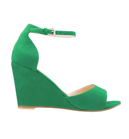 Green wedge sandal on a white background