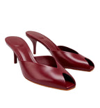 Pair of red high-heeled shoes