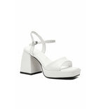 White sandal with block heel on a white background