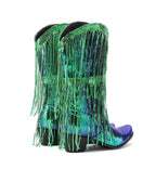 Colorful cowboy boots with green fringe on a white background