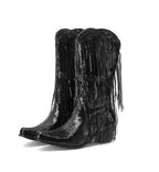 Black sequin cowboy boots with fringes on a white background