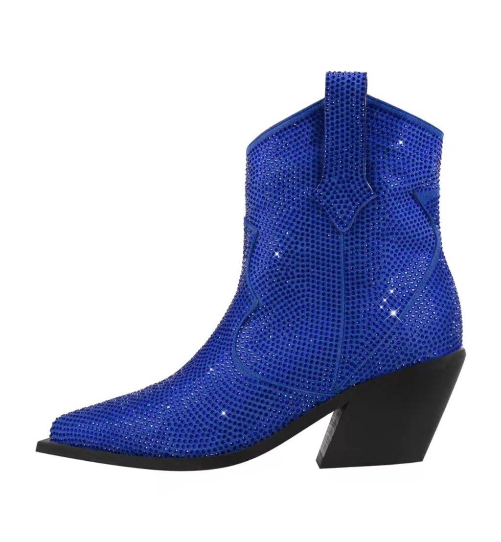 Blue cowboy boot with rhinestone details on a white background