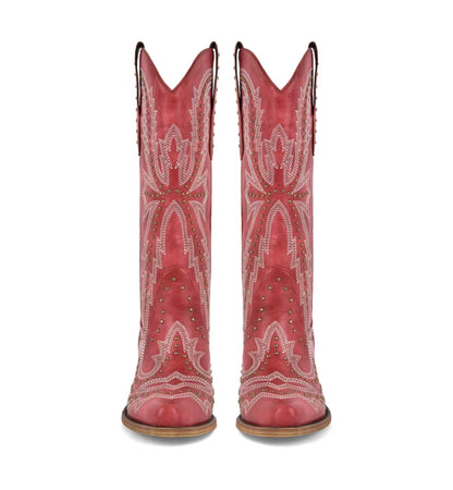 Red cowboy boots with white embroidery and studded details on a white background