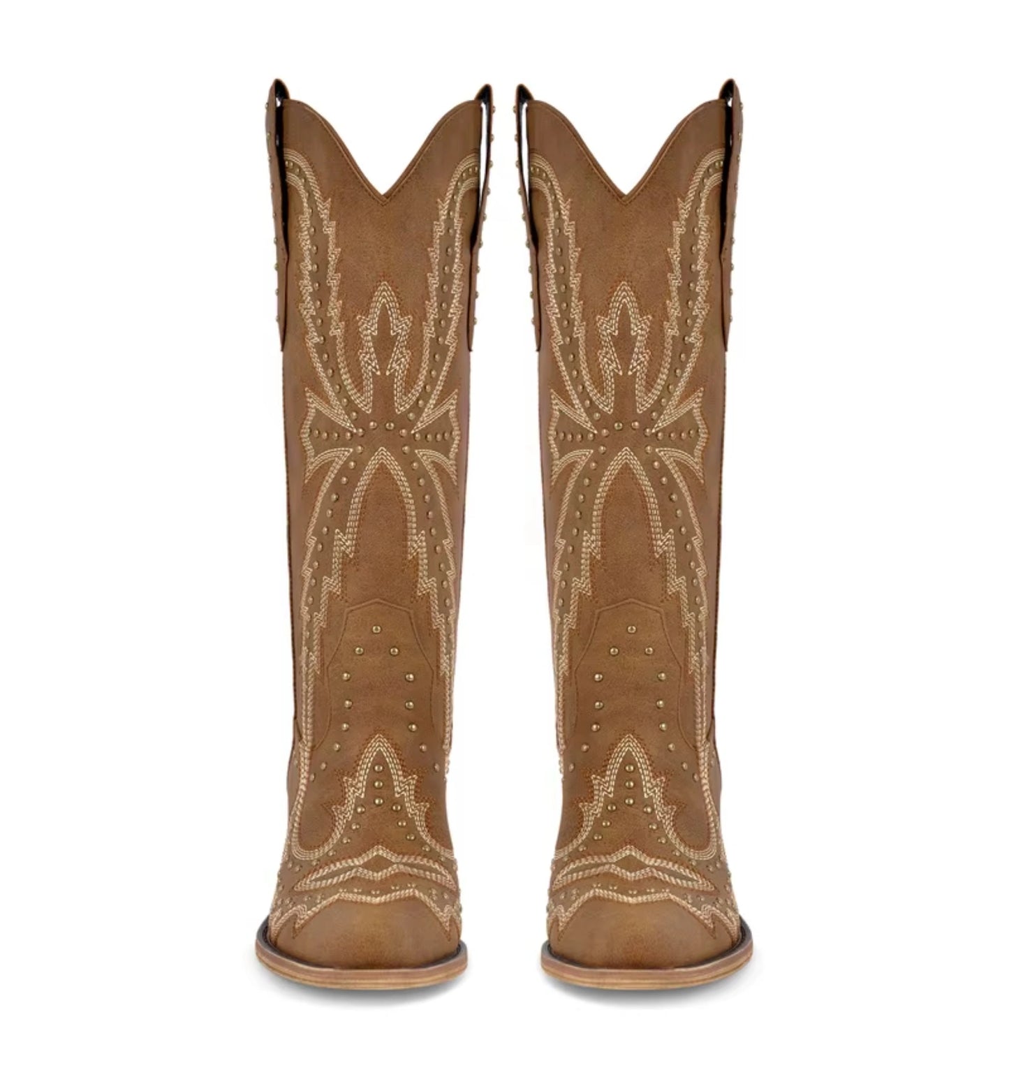 Pair of tan cowboy boots with decorative patterns on a white background