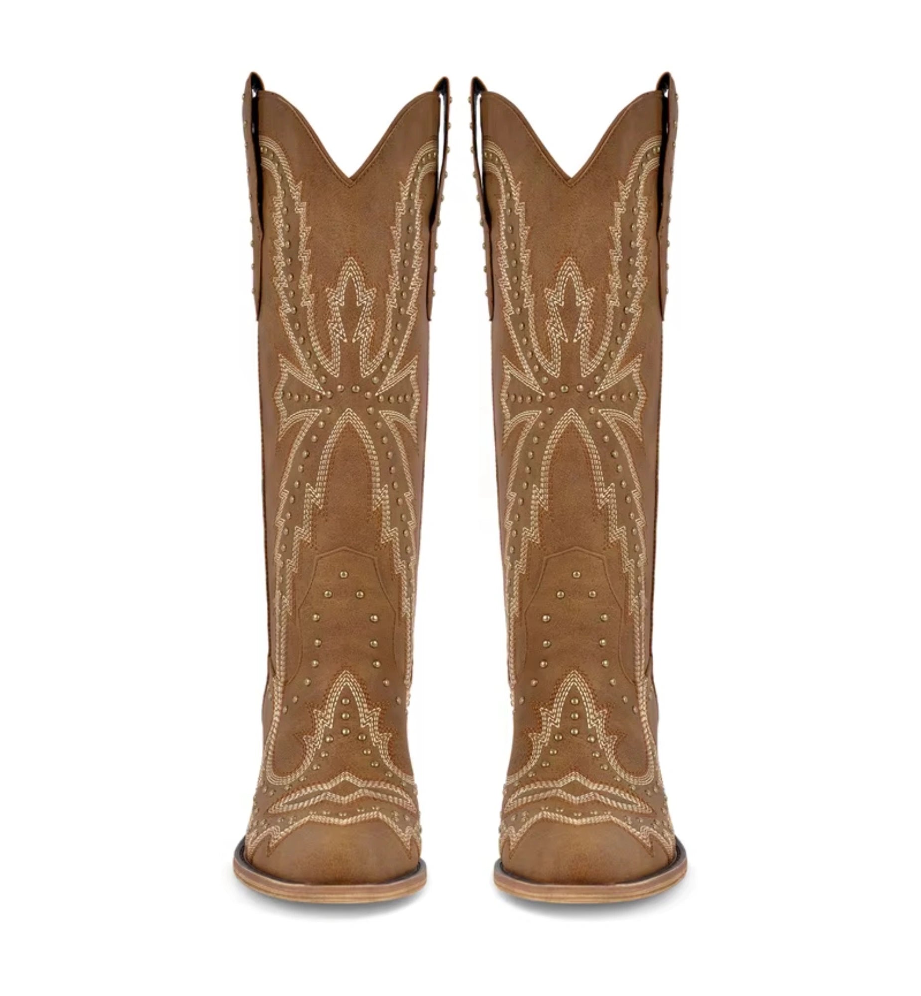 Pair of tan cowboy boots with decorative patterns on a white background