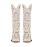 White cowboy boots with decorative patterns and studs on a white background
