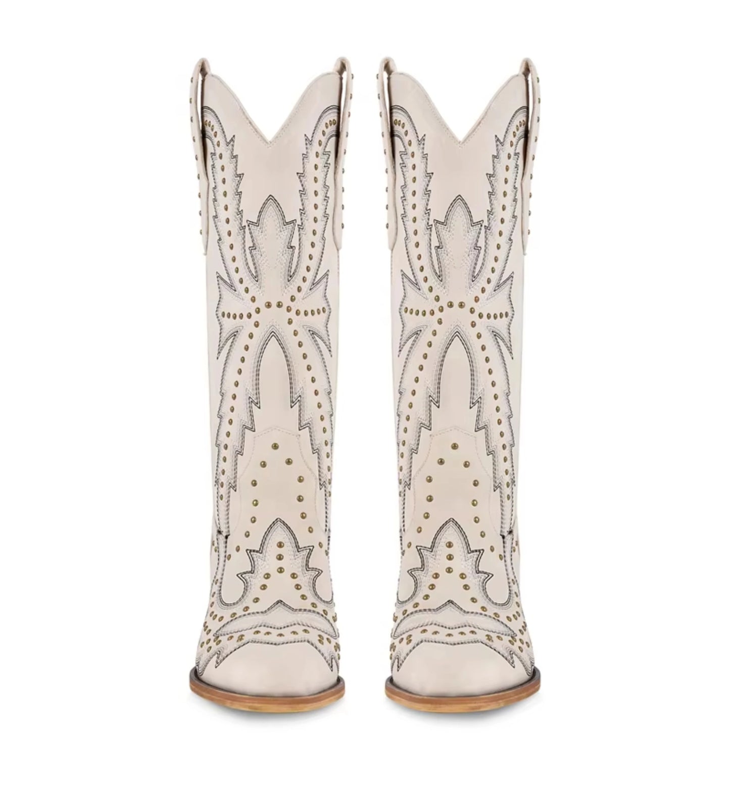 White cowboy boots with decorative patterns and studs on a white background