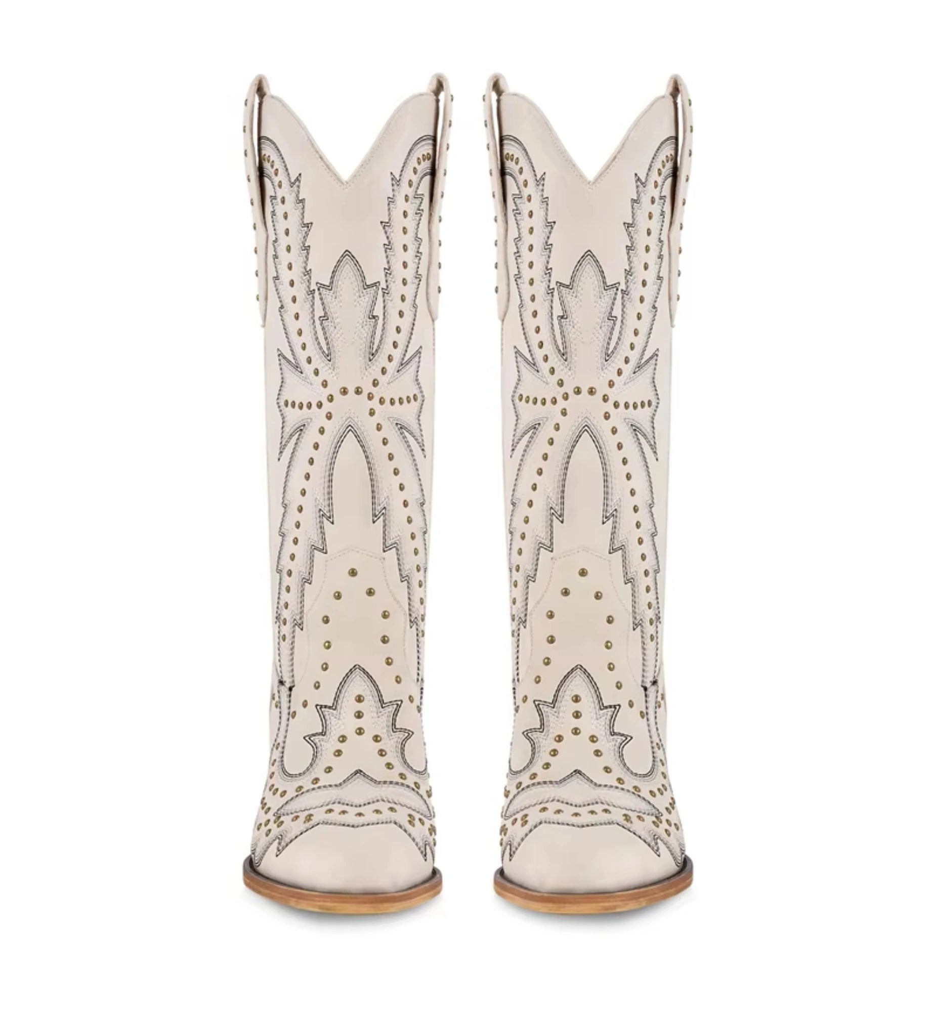 White cowboy boots with decorative patterns and studs on a white background