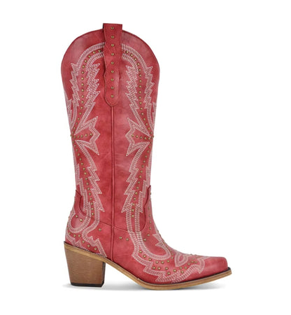 Red cowboy boot with white embroidery on a white background