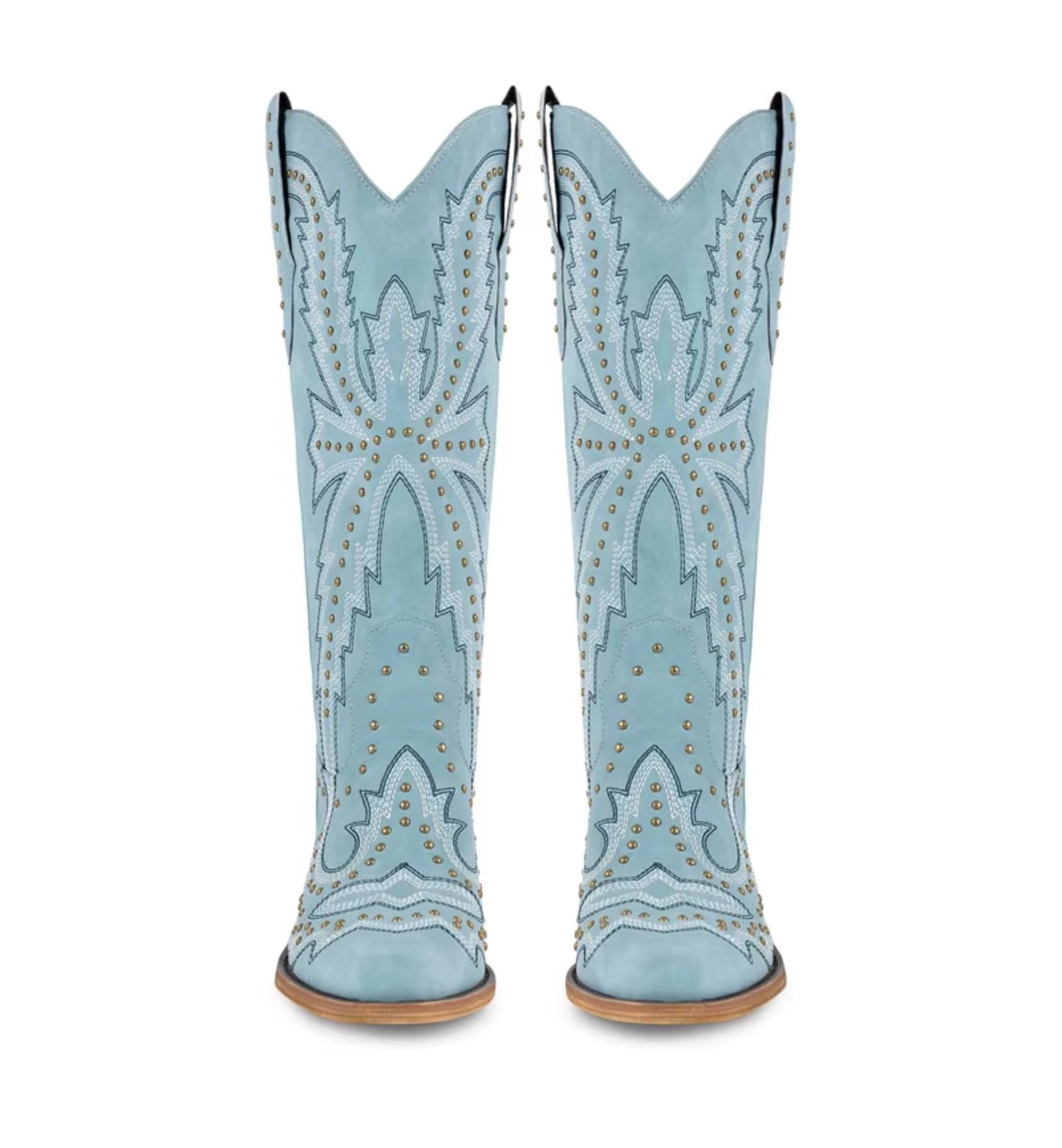 Light blue cowboy boots with studded details on a white background