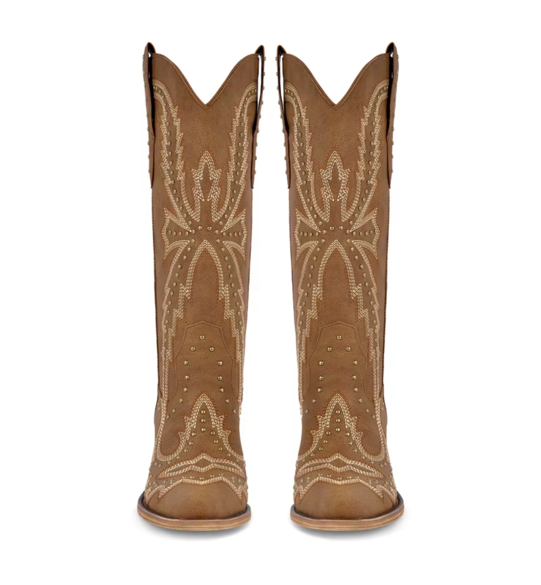 Pair of tan cowboy boots with decorative patterns on a white background
