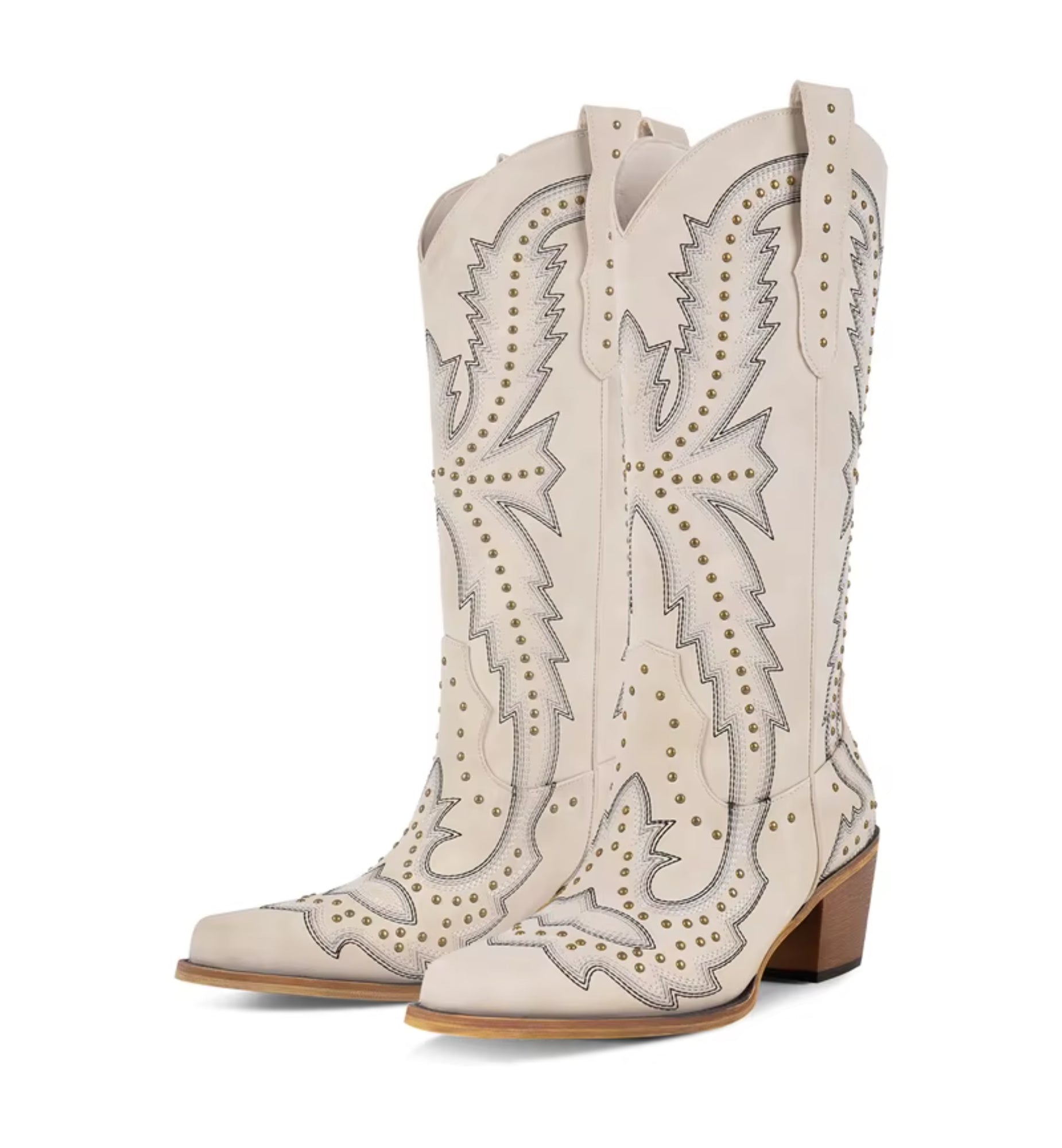 Pair of cream-colored cowboy boots with intricate designs on a white background