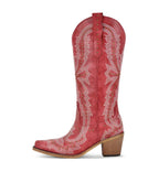 Red cowboy boot with white embroidery on a white background