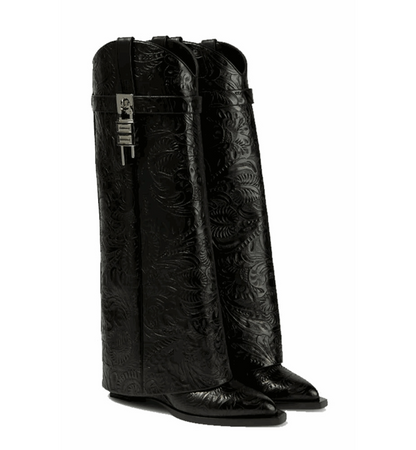 Pair of black leather boots with intricate embossed design on a white background