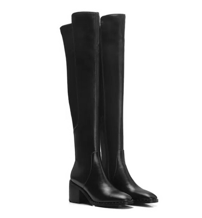 Black knee-high boots on a white background
