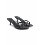 Black high-heeled sandals on a white background