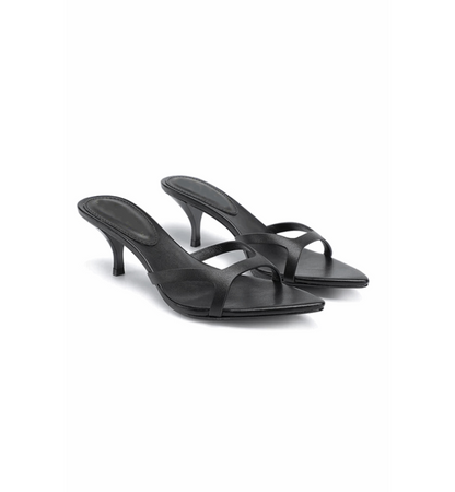 Black high-heeled sandals on a white background