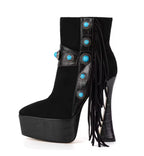 Black high-heeled platform boot with turquoise embellishments on a white background