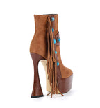 Brown suede high-heeled boot with fringe and turquoise stones on a white background