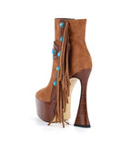 Brown suede high-heeled boot with fringe and turquoise stones on a white background