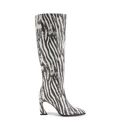 Zebra-striped knee-high boot on a white background