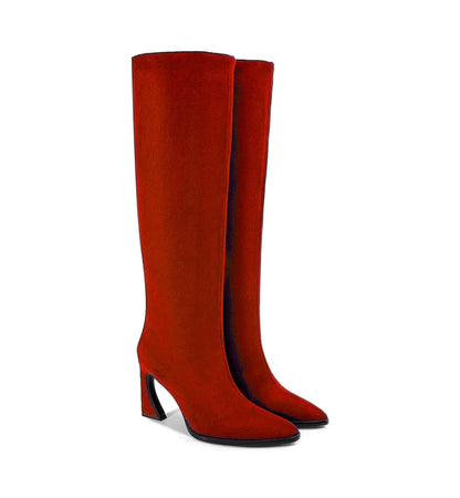 Pair of red knee-high boots on a white background