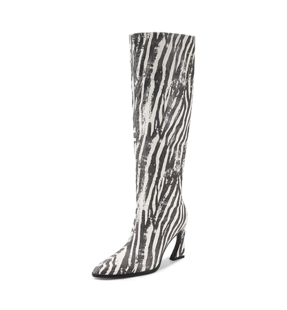 Knee-high heeled boot with a bold black and white zebra print design