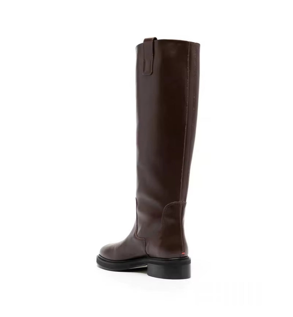 Brown knee-high boot on a white background