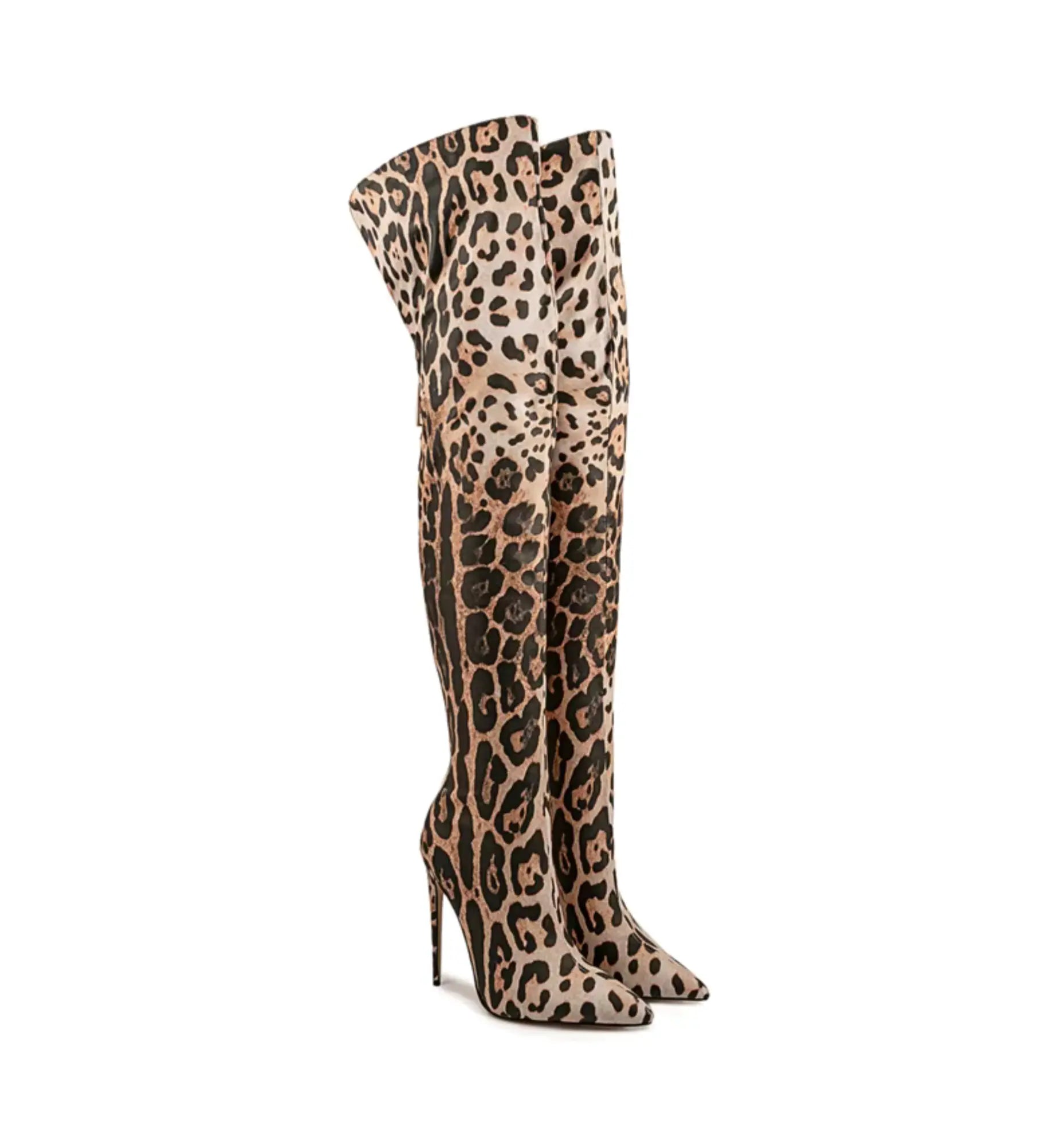 Leopard print knee-high boots on a white background