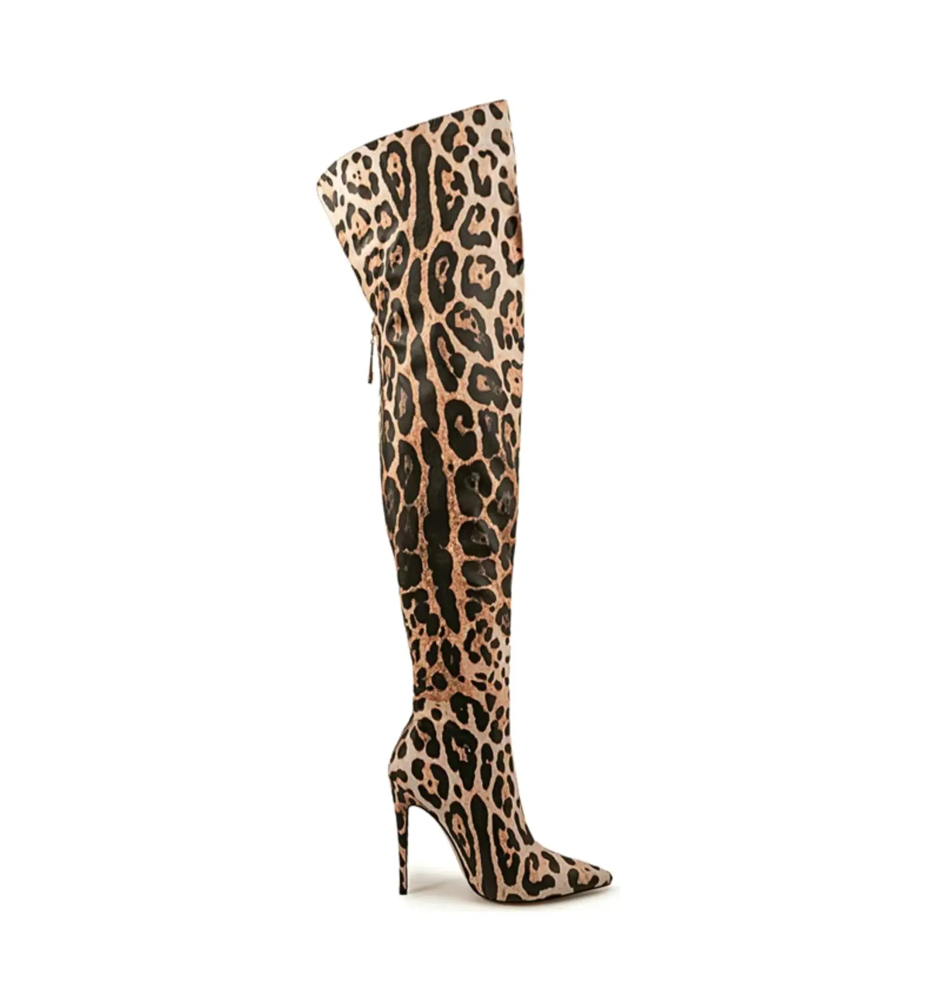 Leopard print knee-high boot on a white background