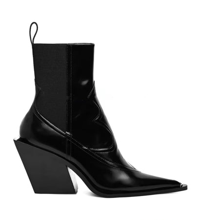 Black ankle boot with a block heel on a white background
