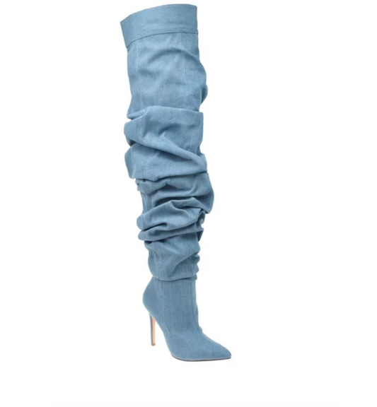 Light blue knee-high sock boot on a white background