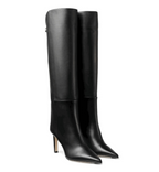 Black knee-high boots on a white background