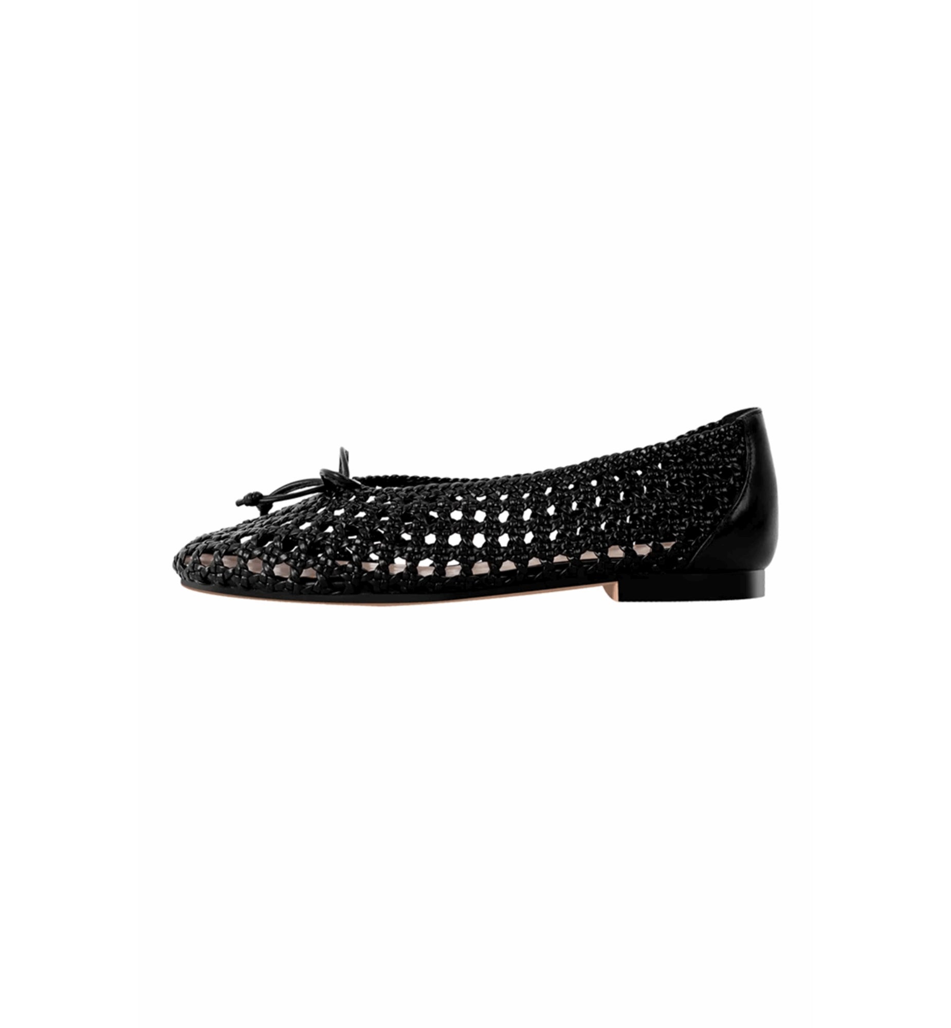Black flat shoe with a decorative bow on a white background