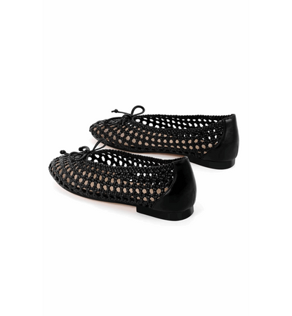 Black woven shoes on a white background