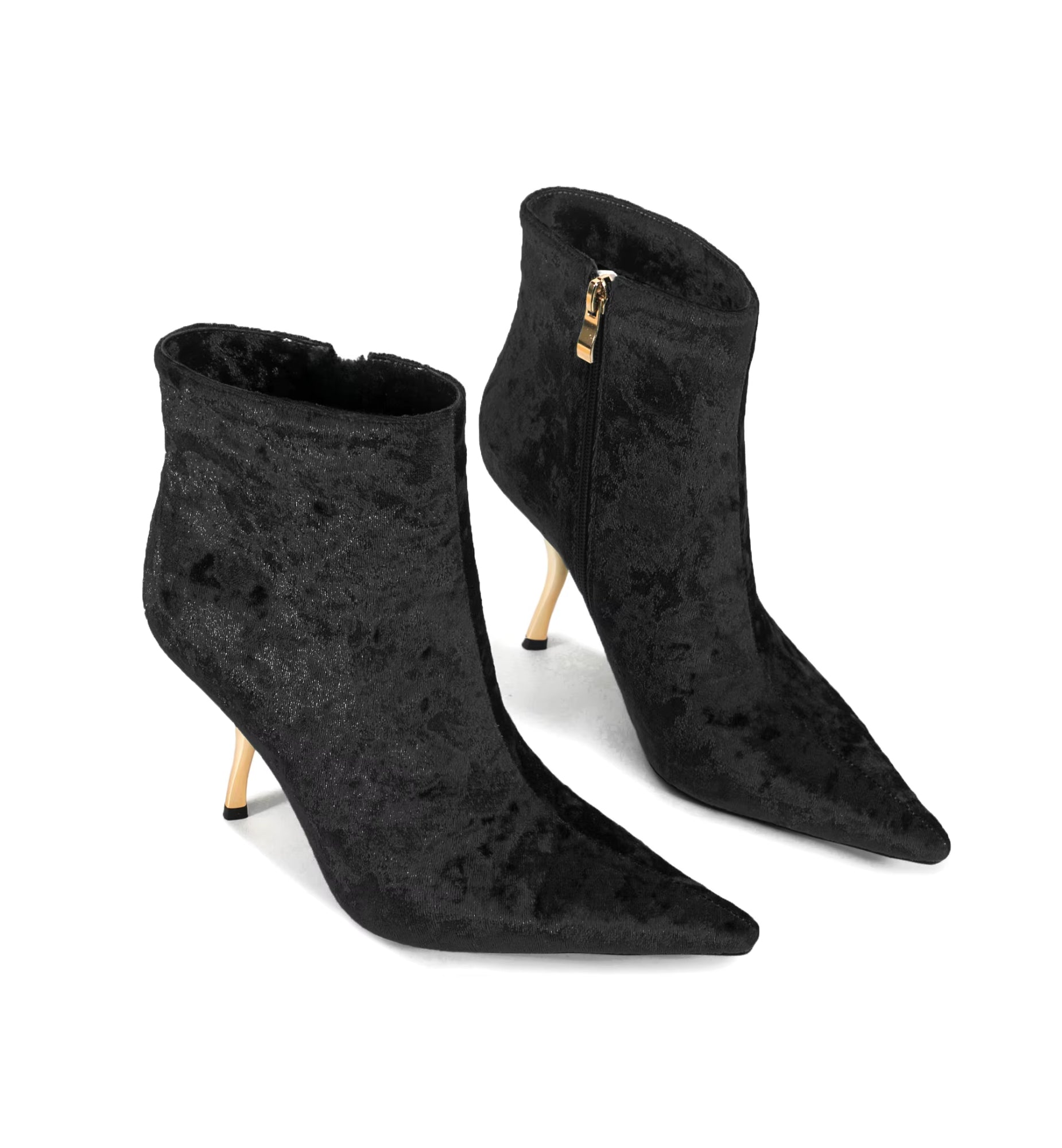 Black suede ankle boots with stiletto heels on a white background