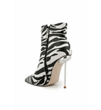 Zebra print high-heeled bootie on a white background