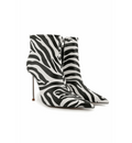 Zebra print high-heeled boots on a white background