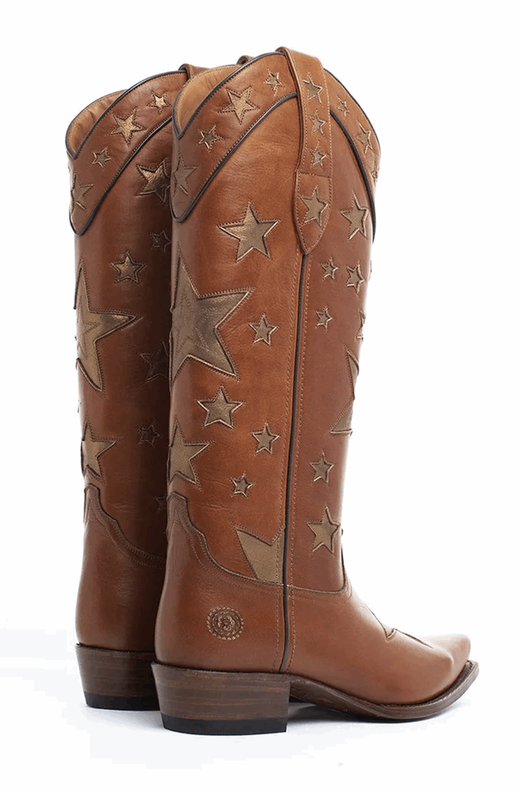 Brown western boots with golden stars