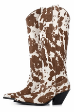 Cow print western boots
