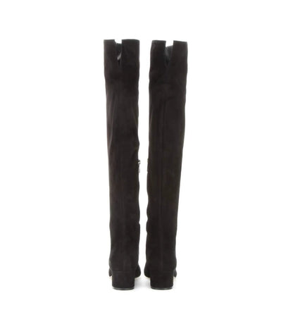 Black knee-high boots on a white background